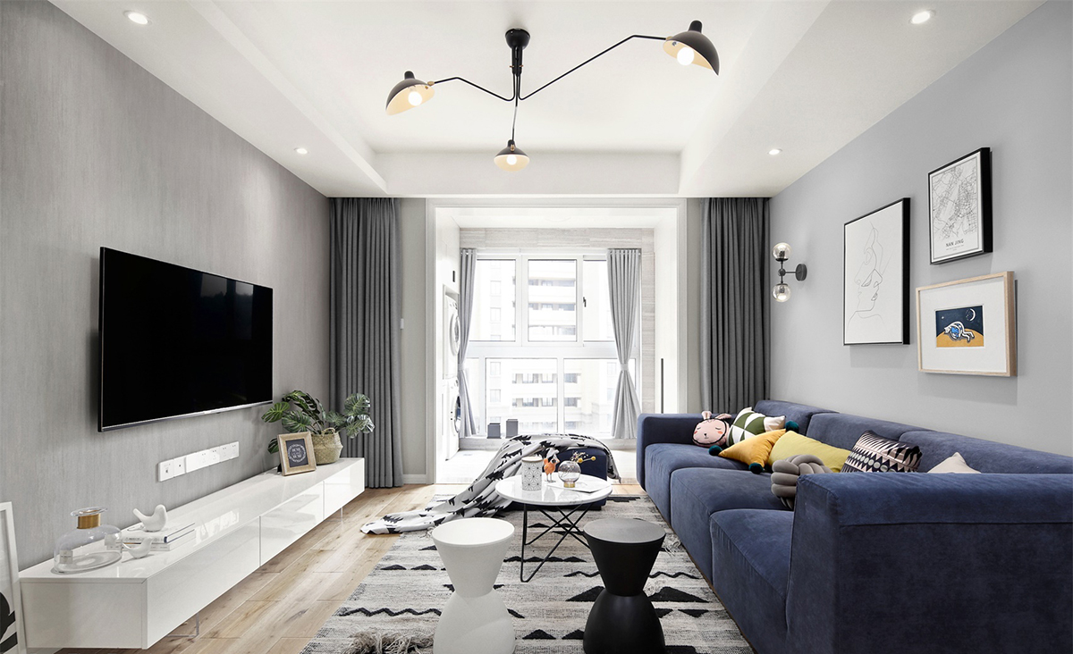 客厅以灰色墙面搭配原木色地板，简约的背景墙设计，看起来干净清爽，同时搭配撞色系的蓝色沙发，局部亮色点缀，起到画龙点睛的作用。
